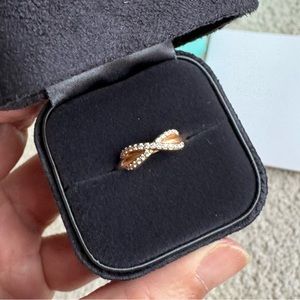 Tiffany “Infinity” Rose Gold Ring w diamonds